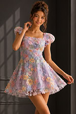 back view of lilac 3D floral dress with tie back and puff sleeves