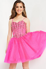 Model wearing Jovani K62533 fuchsia dress, full front view displaying the A-line skirt.