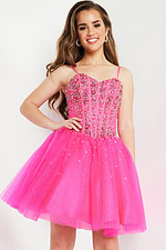 Model wearing Jovani K62533 fuchsia dress with embellished bodice and A-line flare.