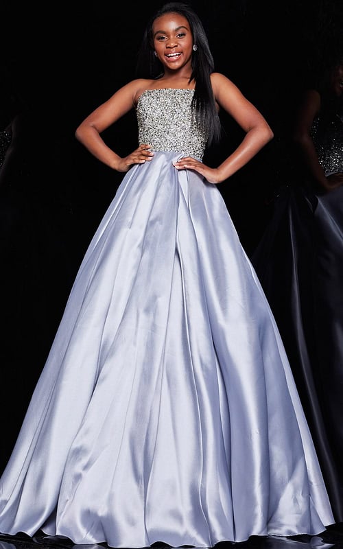Model wearing Jovani K66689 stunning lilac gown with embellishments