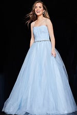 Model wearing Jovani K66712 blue dress highlighting sweetheart neckline.