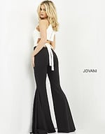 Model in Jovani M02807 showing back view and tied detail of jumpsuit.