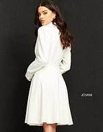 model showing back of Jovani M04302 off-white dress with a flared skirt
