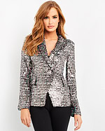 Model wearing Jovani M04827 multi-colored sequin blazer, front view.