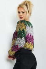 Back view of model in Jovani M05037 dress with sequins.