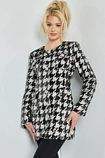 Model in M3393 front facing black and ivory houndstooth dress.