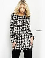 Model in M3393 black and ivory houndstooth dress, front view.