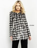 Model showcasing M3393 houndstooth dress, black and ivory front view.
