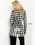 Back view of M3393 black and ivory houndstooth dress worn by model.