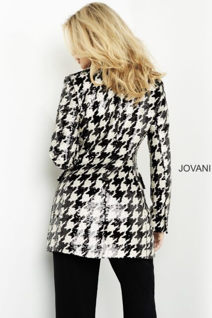 Back view of M3393 black and ivory houndstooth dress worn by model.