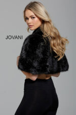 Model wearing Jovani M50165 black dress, front view showcasing V-neckline.