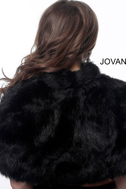 Model wearing Jovani M50165 black dress, frontal view with detailed beading.
