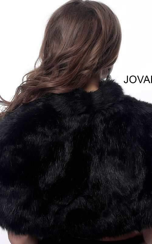 Model showing back view of Jovani M50165 black dress.