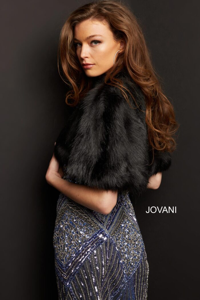 Side view of the Jovani M50165 black dress highlighting elegant profile.