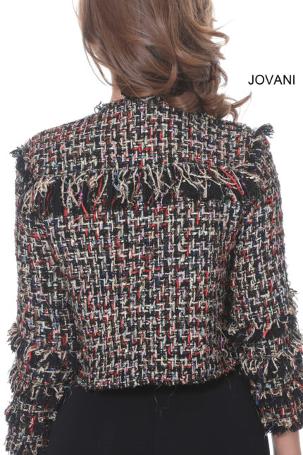 Back view of model wearing Jovani M61374 jacket showing textured fabric.