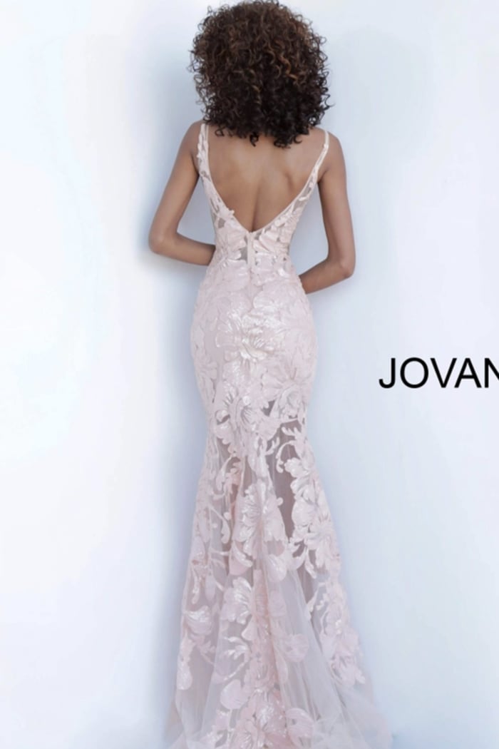 Back view of Jovani 60283 pink gown showcasing intricate floral lace.