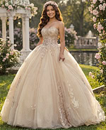 Champagne strapless ball gown with beaded corset bodice and glitter tulle skirt