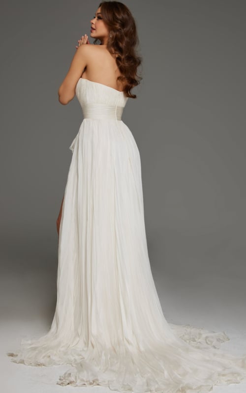 Front view of model wearing Jovani S04373 off-white gown with thigh-high slit.