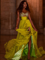 Model posing in Jovani S05823 vibrant green gown with sweetheart neckline, front view