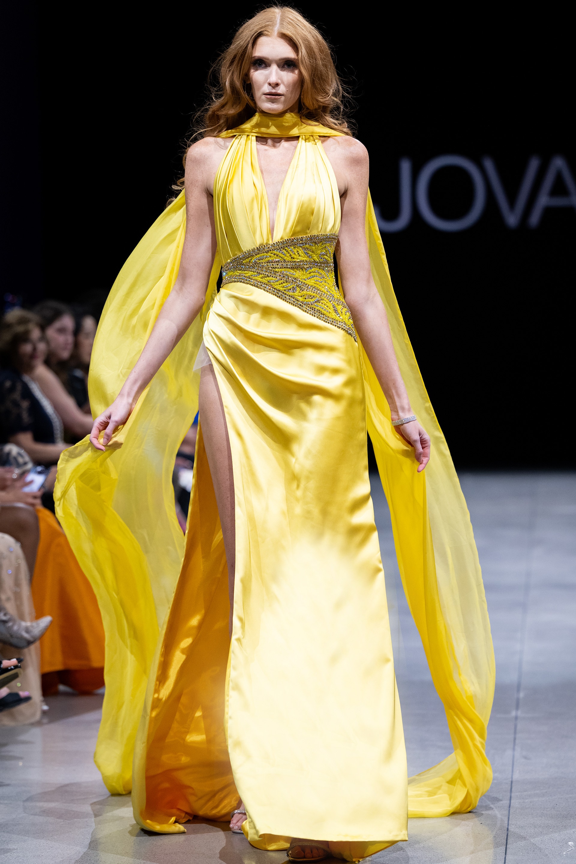 S22826.jpg Model wearing S22826 yellow dress with V-neckline and high slit