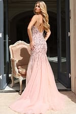 Glamorous beaded gown with sheer plunging front and mermaid silhouette