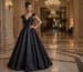 black satin A-line evening gown with cap sleeves