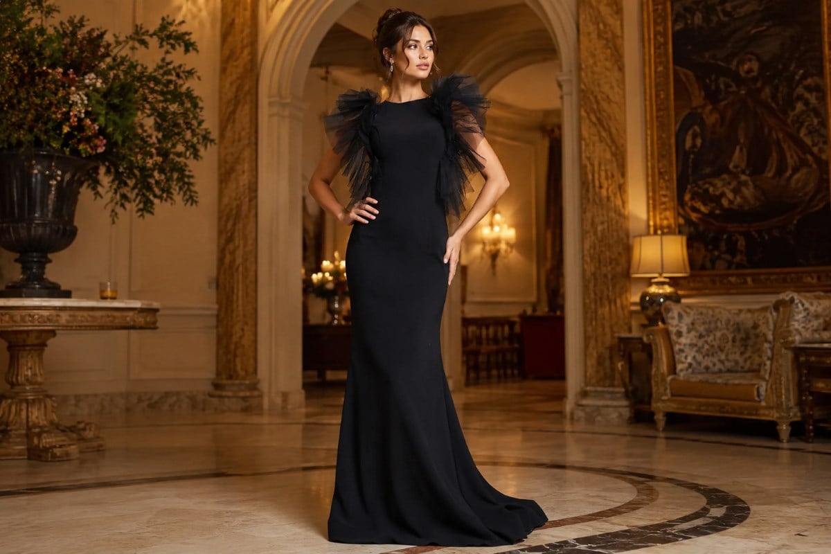 Black embellished evening gown with feathers in dramatic luxury interior