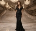 black sequin mermaid evening gown with sheer sleeves and deep V neckline