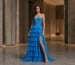 blue strapless ruffled tiered prom gown with high slit