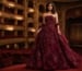 burgundy strapless floral ball gown with voluminous skirt