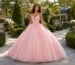 Elegant floral quinceañera ball gown in luxury garden setting