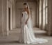 Floral lace strapless gown in a stone mansion.