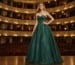 Emerald green strapless ball gown with floral appliqué