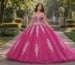 Pink quinceañera ball gown with floral appliqué in garden
