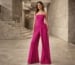 Fuchsia strapless wide-leg evening jumpsuit with overlay panel