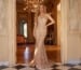 Model in gold mermaid gown