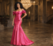 Hot pink off-shoulder mermaid evening gown in a luxury classical hall