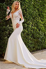 Model wearing Jovani JB07632 elegant ivory mermaid gown with lace sleeves and deep V-neckline.