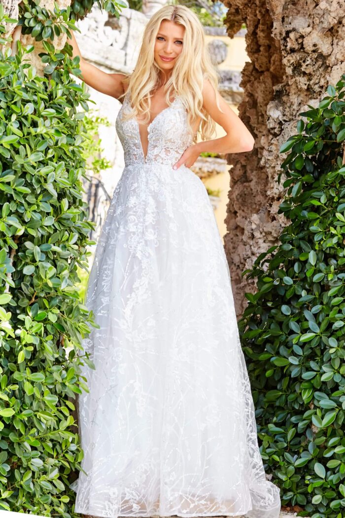Model showcasing Jovani JB07646 ivory dress with A-line silhouette