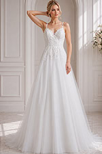 A-line tulle gown with floral lace appliqués and delicate straps.