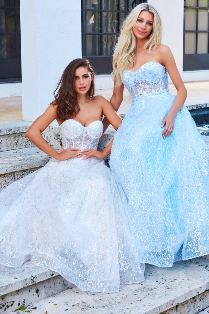 Two models wearing Jovani 08417 blue and ivory dresses