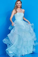 Front view of child model in Jovani K02442 blue dress.