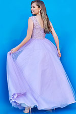Back view of model in K06822 lilac gown with sweeping A-line skirt and lace details.