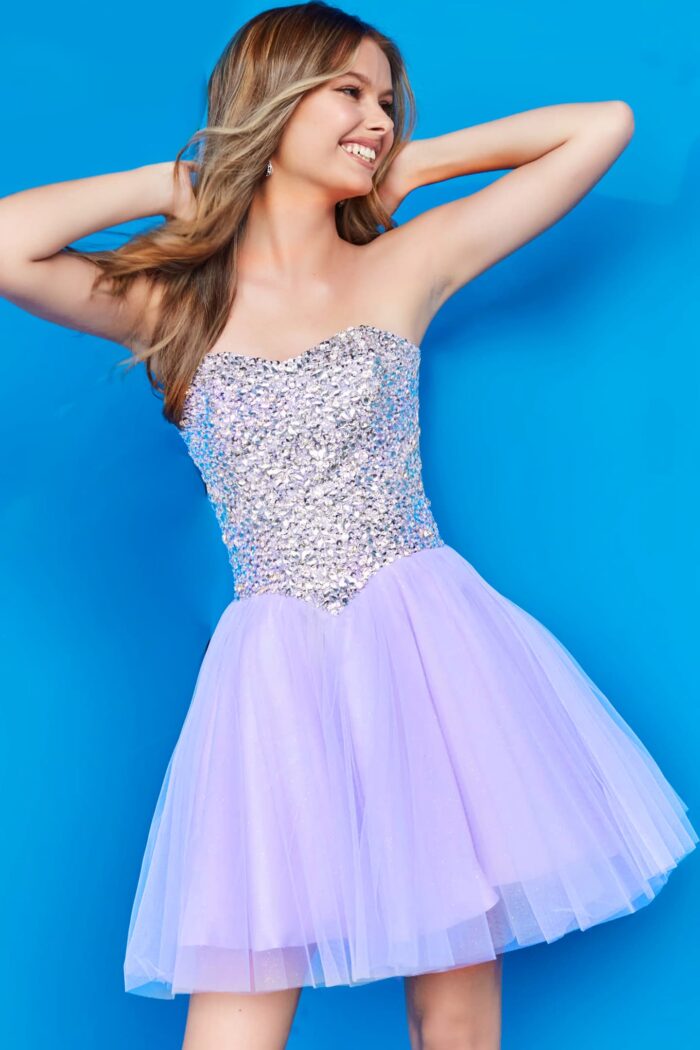 Model in K22231 lilac dress with sequin bodice and tulle skirt, front view.