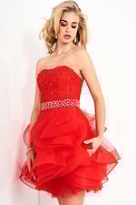 model wearing Jovani k3099 red dress with lace bodice and beaded belt back view
