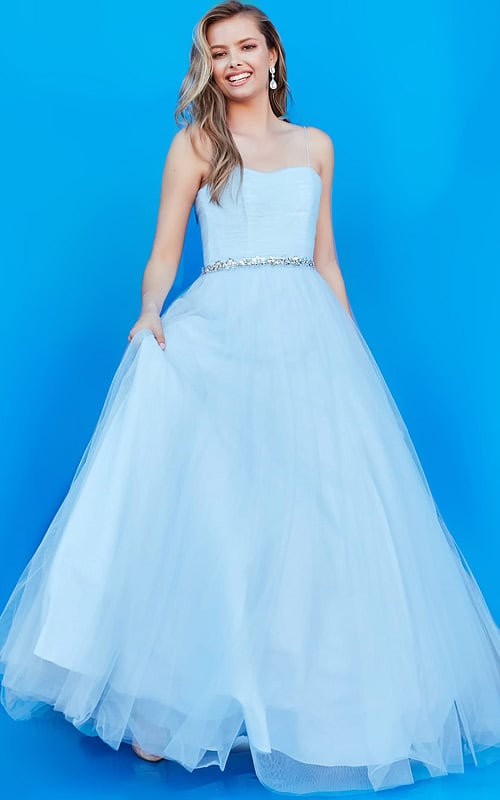 Model wearing Jovani k66712 blue ball gown with sweetheart neckline and embellished waistband.