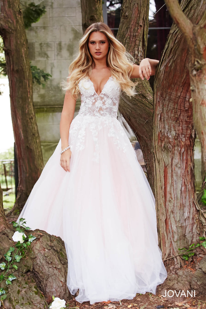 Model wearing Jovani 55634 Red Floral Appliques Dress 2023