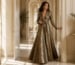 Metallic natural waist evening gown in elegant hallway