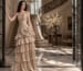 Metallic tiered strapless formal gown in luxury mansion