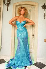 Model wearing 23077 blue sequin gown with sweetheart neckline, full front view